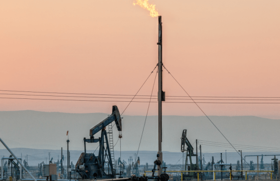 Flares burning off gas at Belridge Oil Field and hydraulic fracking site, which is the fourth largest oil field in California.